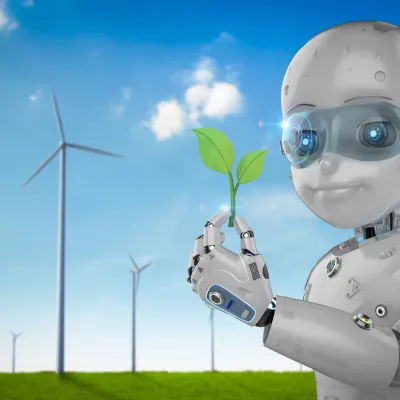 Robot met groen blaadje in zijn handen