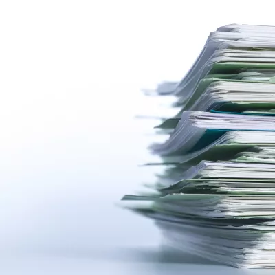 Stapel papier met persoonsgegevens